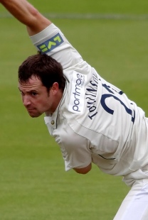 James Tomlinson took three wickets for just two runs with his final two overs of the day